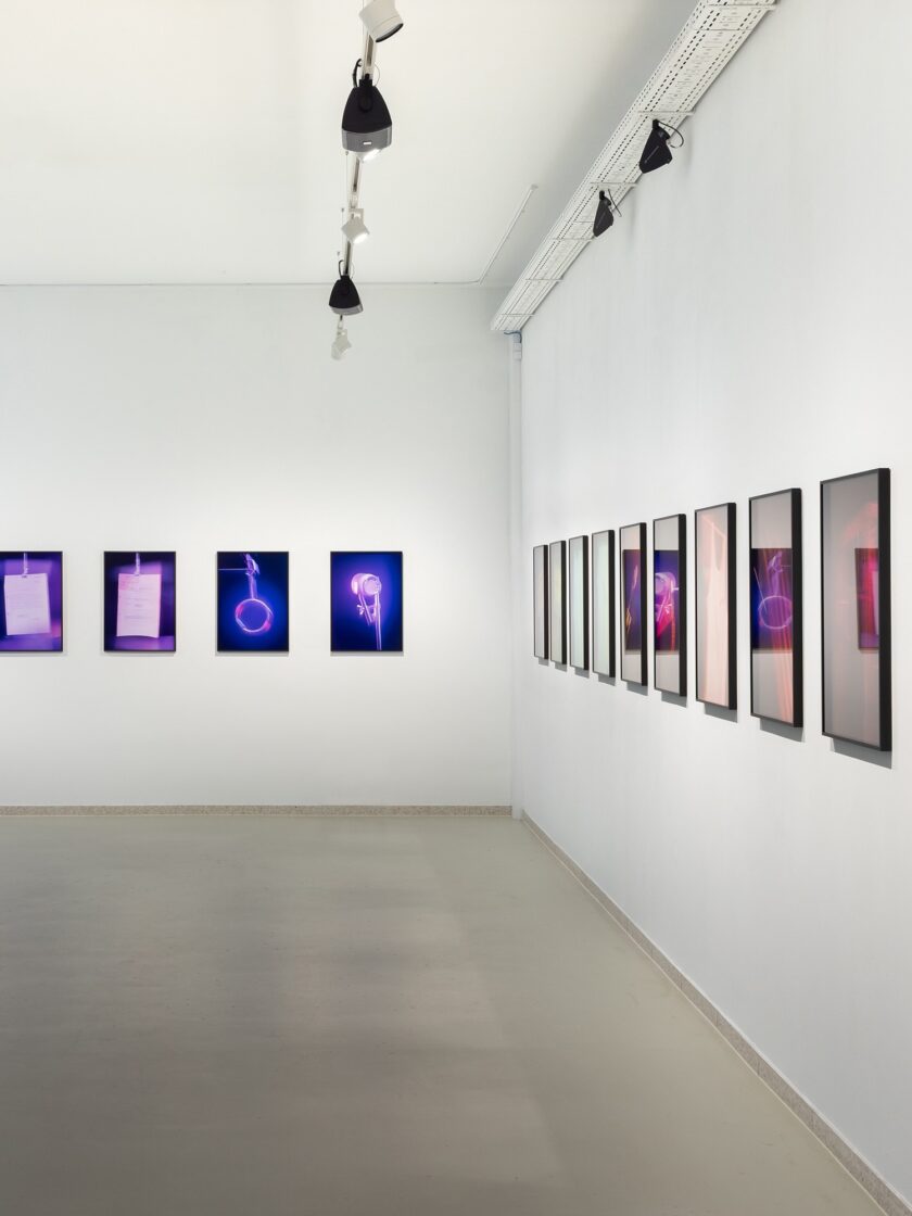 Gallery view of "Aura" exhibition by Mario Kiesenhofer, featuring framed artworks on white walls.