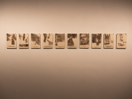 Gallery wall displaying a series of sketches by Wolfgang, showcasing diverse artistic expressions.