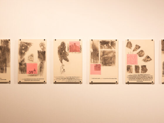 Series of sketches by Wolfgang displayed on a gallery wall, featuring diverse artistic styles.